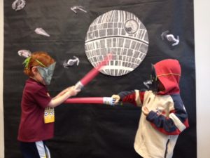 Children playing Star Wars